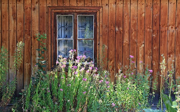 Tuinschilderij met venster doorkijkje